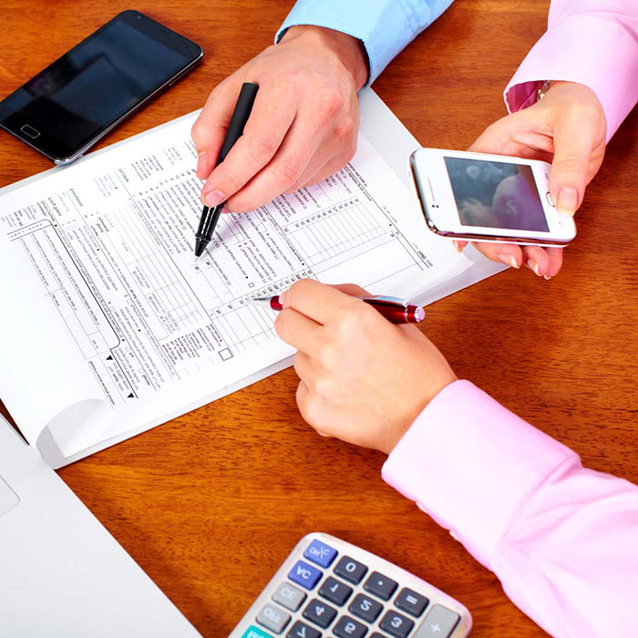 accountants filling paperwork taxes layton ut